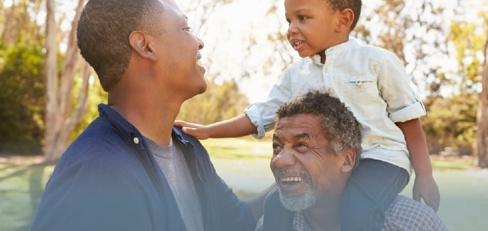 african american family father son visit grandfather independent living facility lawn